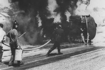 CFA historical image fighting a petrol tanker 1960s