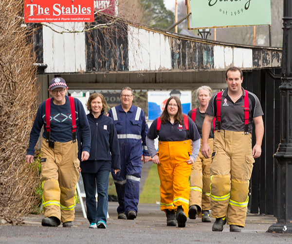 Volunteers walking along the street