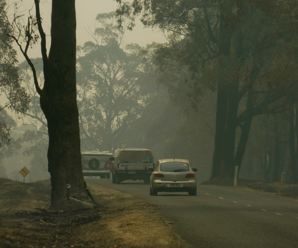 Cars in smokey road