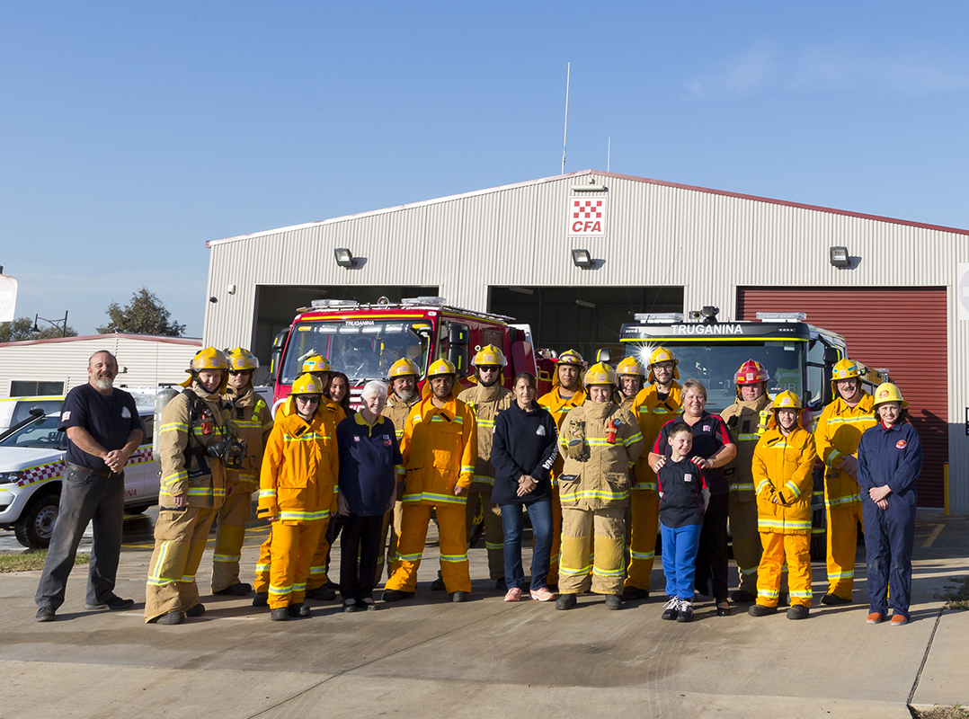 Group shot of volunteers at fire station