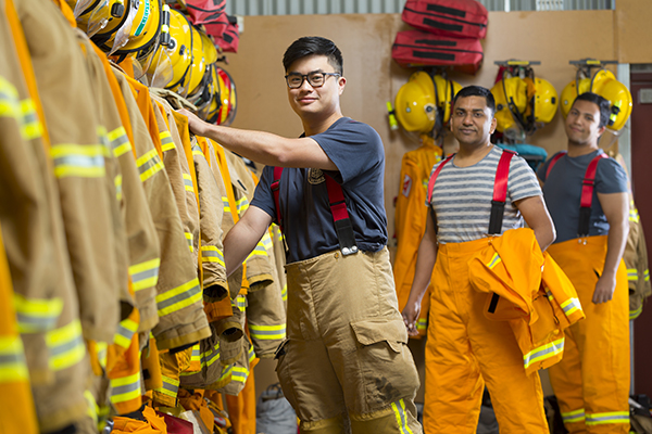 volunteers in dressing area at fire station