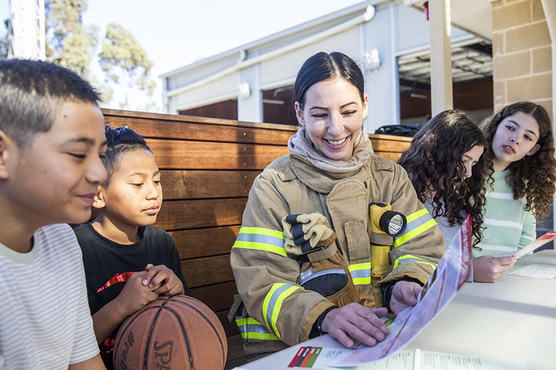 CFA Vol with kids and brochure