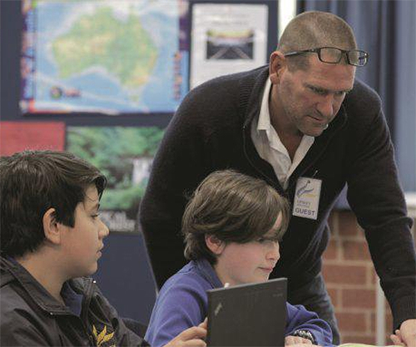 Teacher with students