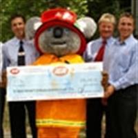 captain Koala with a cheque