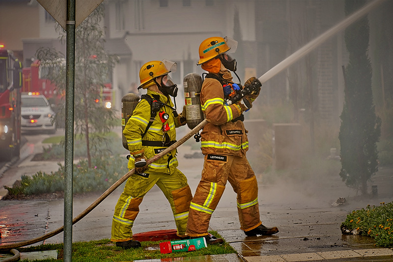 Firefighters taking out a fire