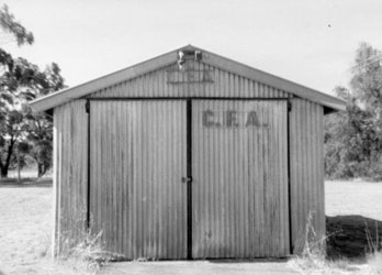 CFA historical image galvanized tin sheds to house trucks 1957