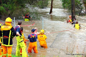 CFA rescuing a man trapped in the floods 2010s