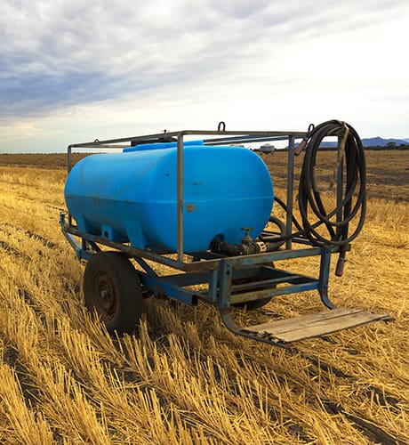 private fire trailer in stubble field 460x500