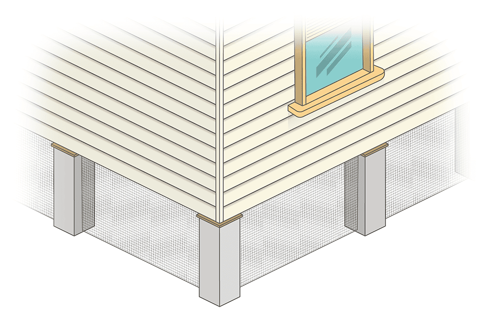The corner of a house with a window and showing metal mesh screening off the under-floor space