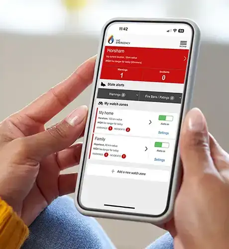 Person holding mobile vicemergency app 460