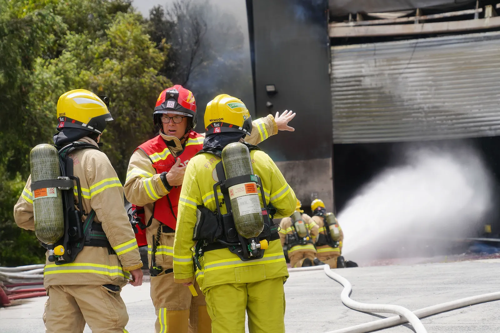 hallam-factory-fire-firefighters-talking