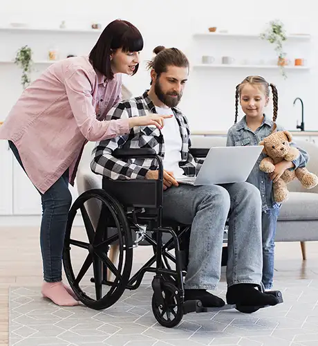 Woman man in wheelchair and child indoors 460